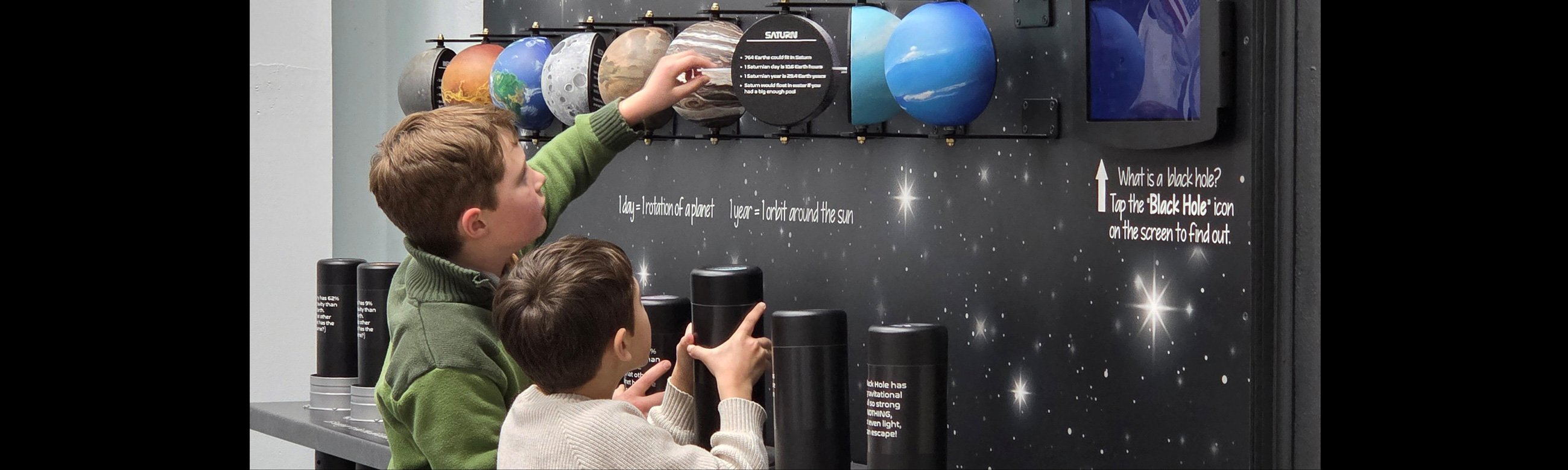 Kids playing at the Deke Slayton Memorial Space & Bicycle Museum